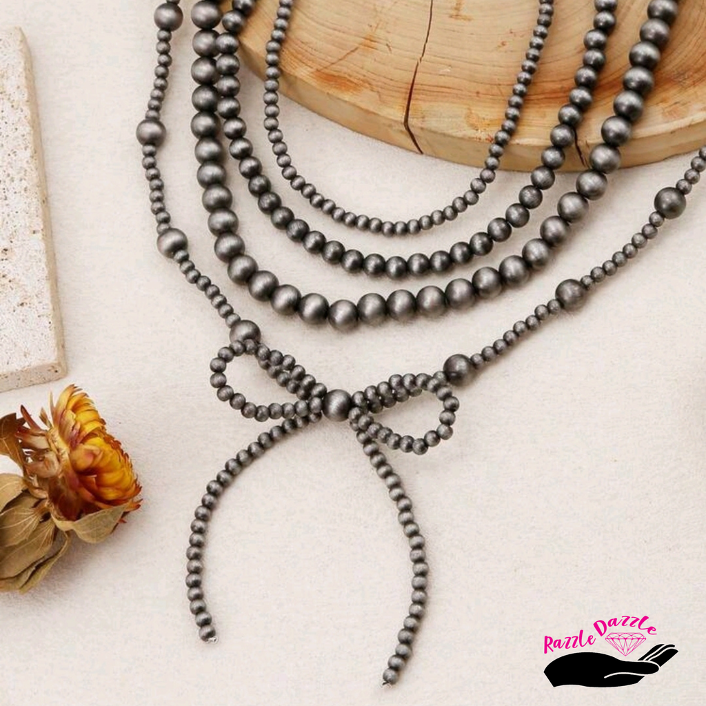 Midnight Bow 4 PC. Necklace set